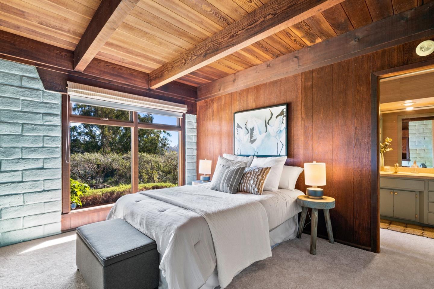 390 Rancho Soquel Drive Soquel, CA 95073 - Photo 55 of 97 a bedroom with a large bed and a large window