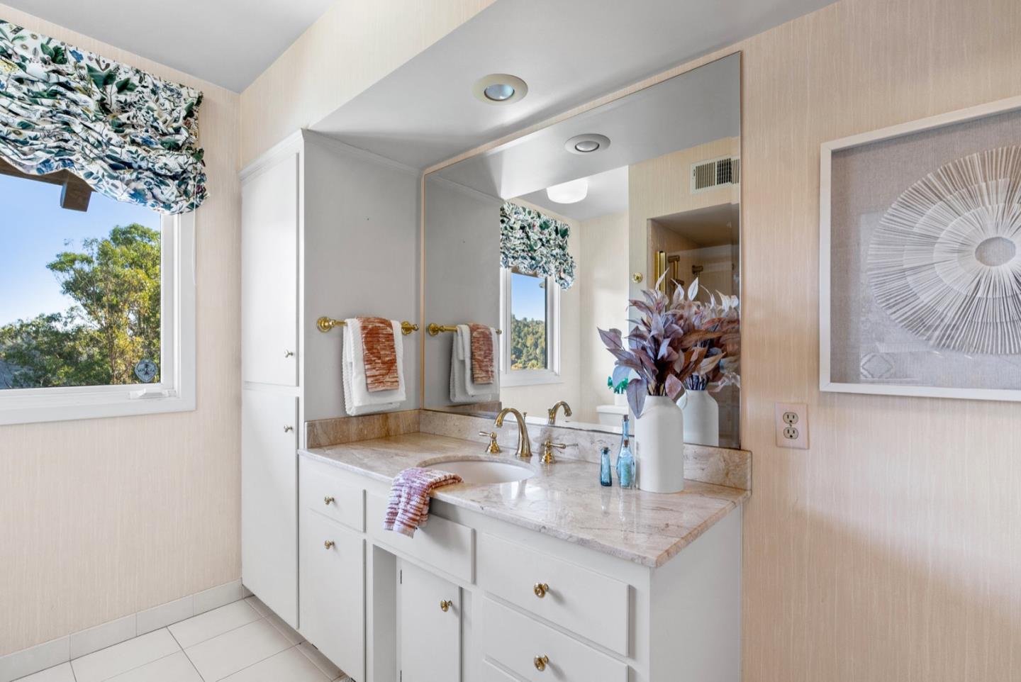 390 Rancho Soquel Drive Soquel, CA 95073 - Photo 65 of 97 a bathroom with a granite countertop sink and a mirror