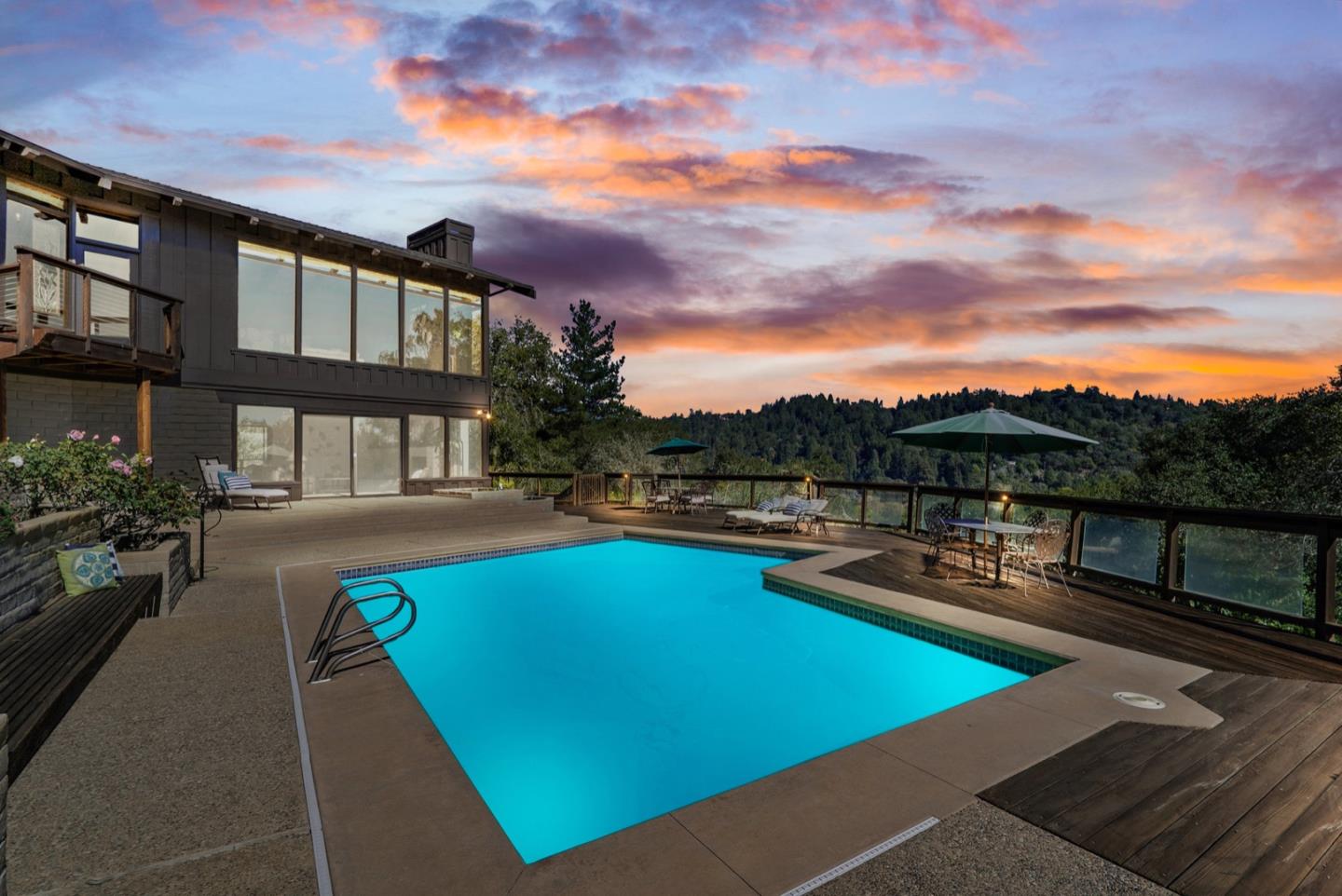 390 Rancho Soquel Drive Soquel, CA 95073 - Photo 73 of 97 a view of a swimming pool with a lounge chair