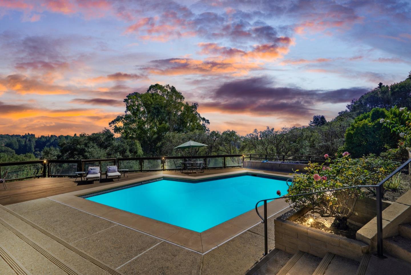 390 Rancho Soquel Drive Soquel, CA 95073 - Photo 74 of 97 a view of swimming pool with seating space and trees in the background