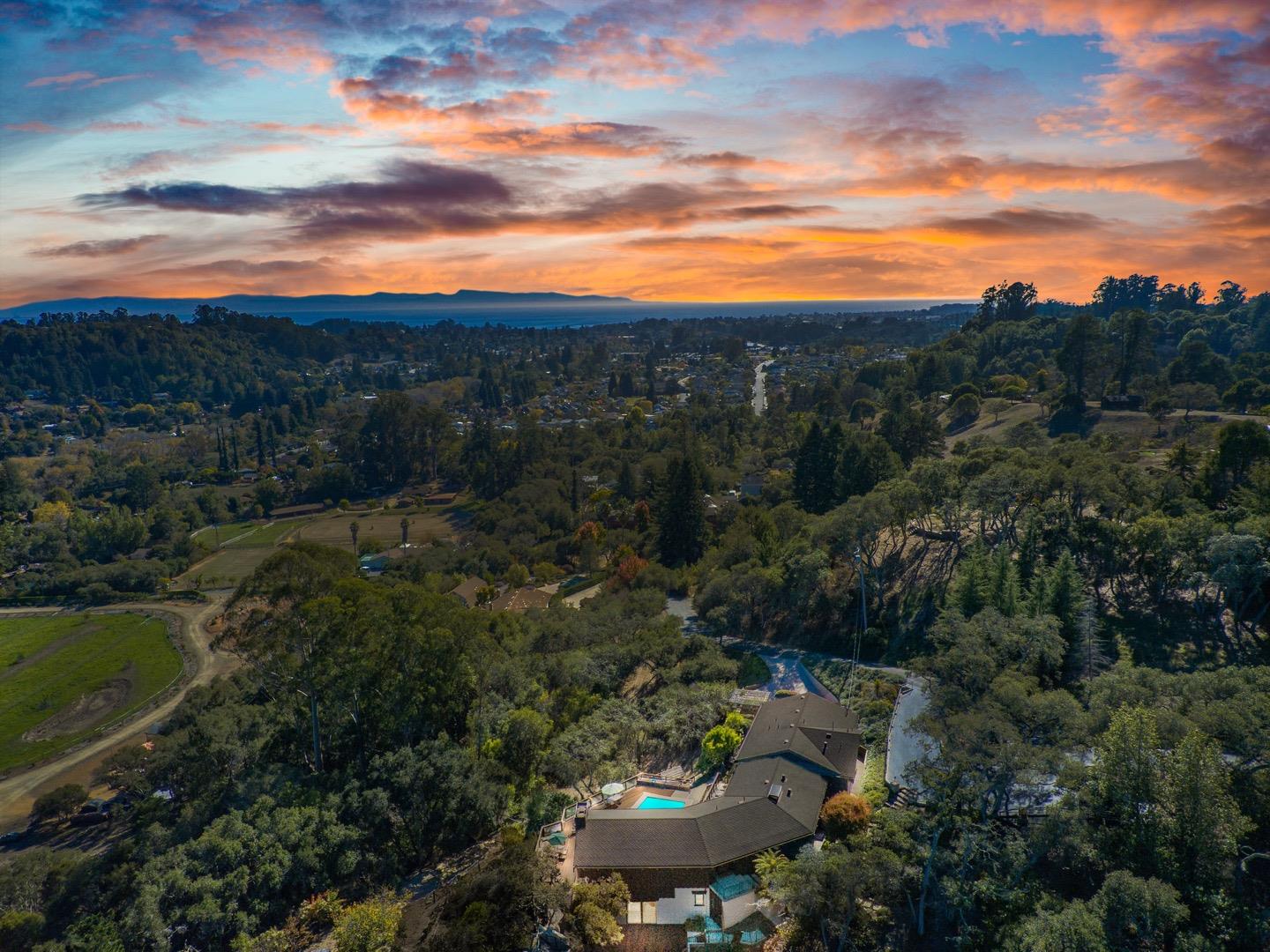 390 Rancho Soquel Drive Soquel, CA 95073 - Photo 76 of 97 a view of a city with lush green forest