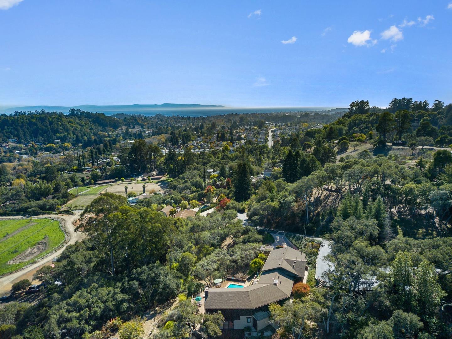390 Rancho Soquel Drive Soquel, CA 95073 - Photo 96 of 97 a view of a city with lush green forest