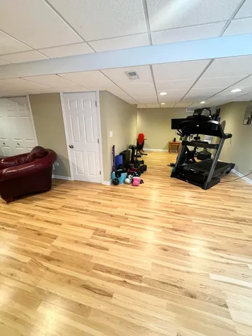 a view of a room with gym equipment