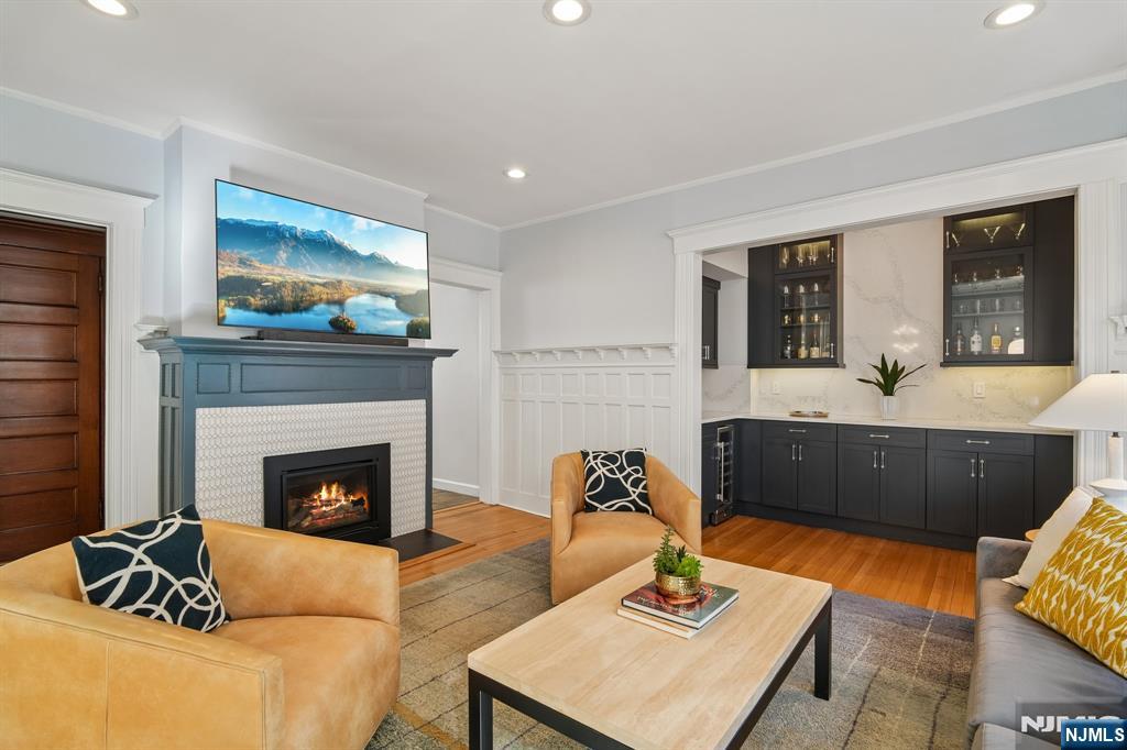 115 Park Street Montclair, NJ 07042 - Photo 11 of 45 a living room with furniture and a fireplace