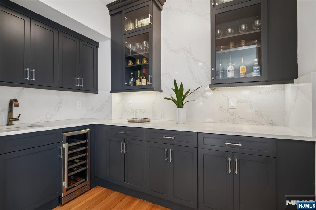 115 Park Street Montclair, NJ 07042 - Photo 15 of 45 a kitchen with a sink and cabinets