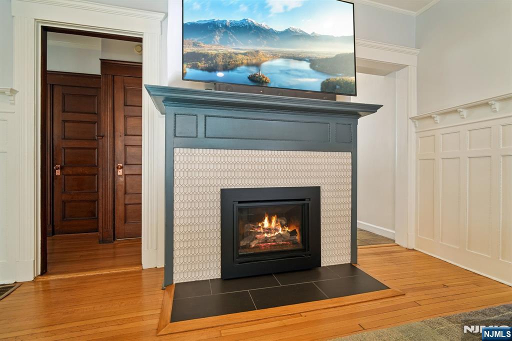 115 Park Street Montclair, NJ 07042 - Photo 16 of 45 a living room with a fireplace