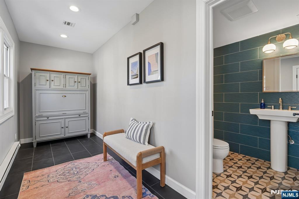 115 Park Street Montclair, NJ 07042 - Photo 31 of 45 a bathroom with a sink toilet and shower
