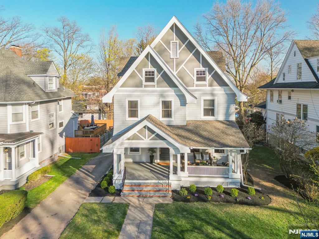 115 Park Street Montclair, NJ 07042 - Photo 33 of 45 a front view of a house with a yard