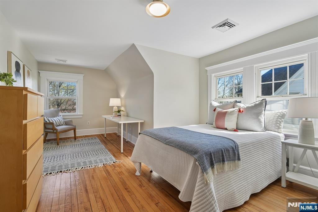 115 Park Street Montclair, NJ 07042 - Photo 36 of 45 a bed room with a bed and a window