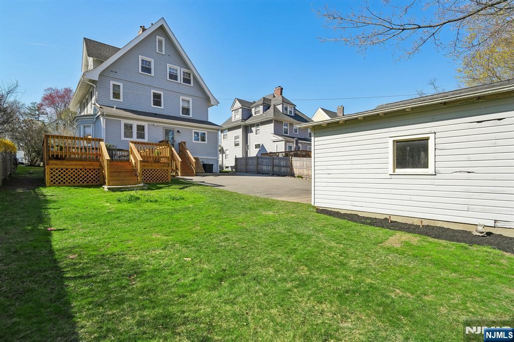 115 Park Street Montclair, NJ 07042 - Photo 41 of 45 a front view of a house with yard and green space
