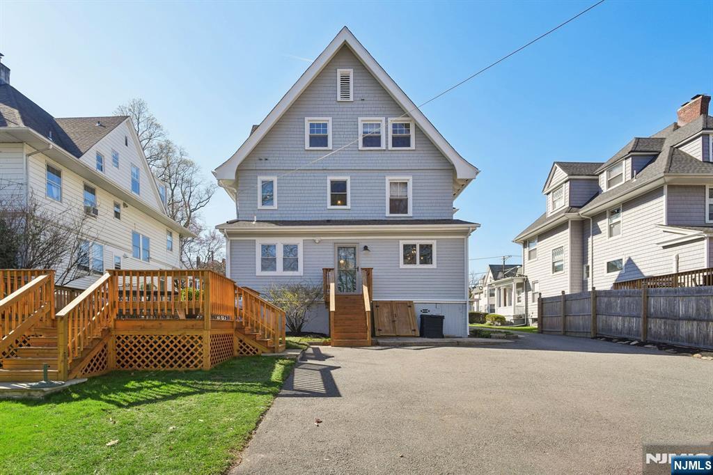 115 Park Street Montclair, NJ 07042 - Photo 42 of 45 a front view of a house with a yard