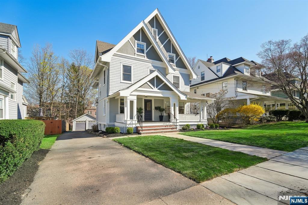 115 Park Street Montclair, NJ 07042 - Photo 43 of 45 a front view of a house with a yard and trees