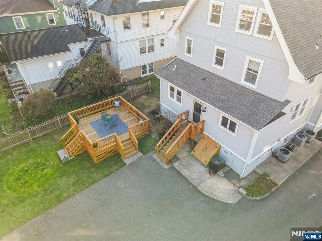 115 Park Street Montclair, NJ 07042 - Photo 44 of 45 an aerial view of a house with backyard space and balcony