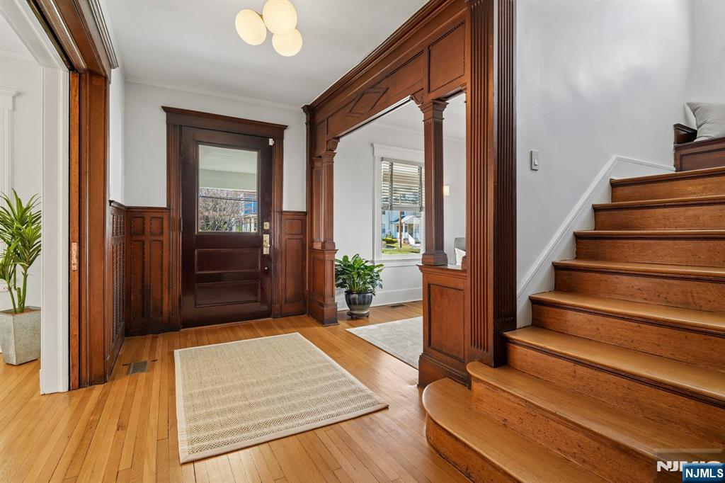 115 Park Street Montclair, NJ 07042 - Photo 6 of 45 a view of an entryway with wooden floor and front door
