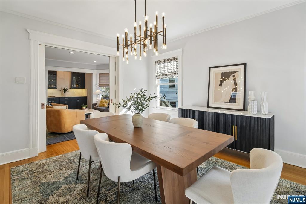 115 Park Street Montclair, NJ 07042 - Photo 8 of 45 a view of a dining room with furniture and chandelier