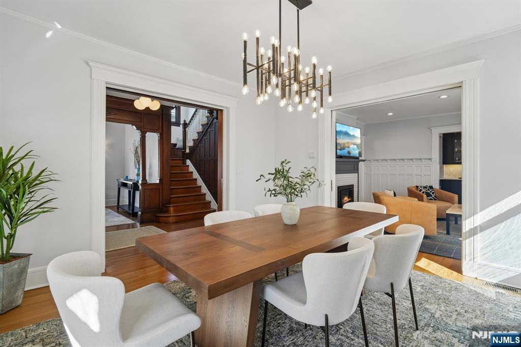 115 Park Street Montclair, NJ 07042 - Photo 9 of 45 a view of a dining room with furniture wooden floor and chandelier