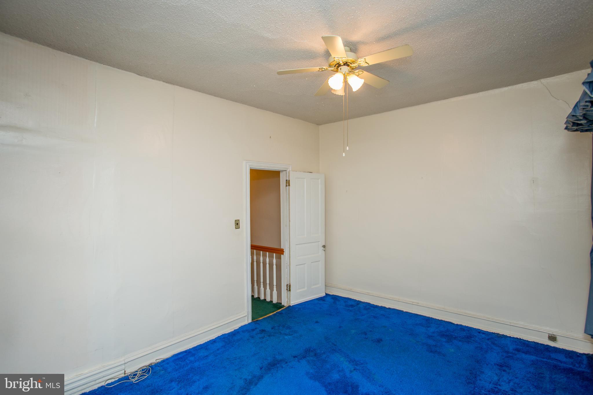 2116 North Natrona Street Philadelphia, PA 19121 - Photo 20 of 53 a view of an empty room with wooden floor