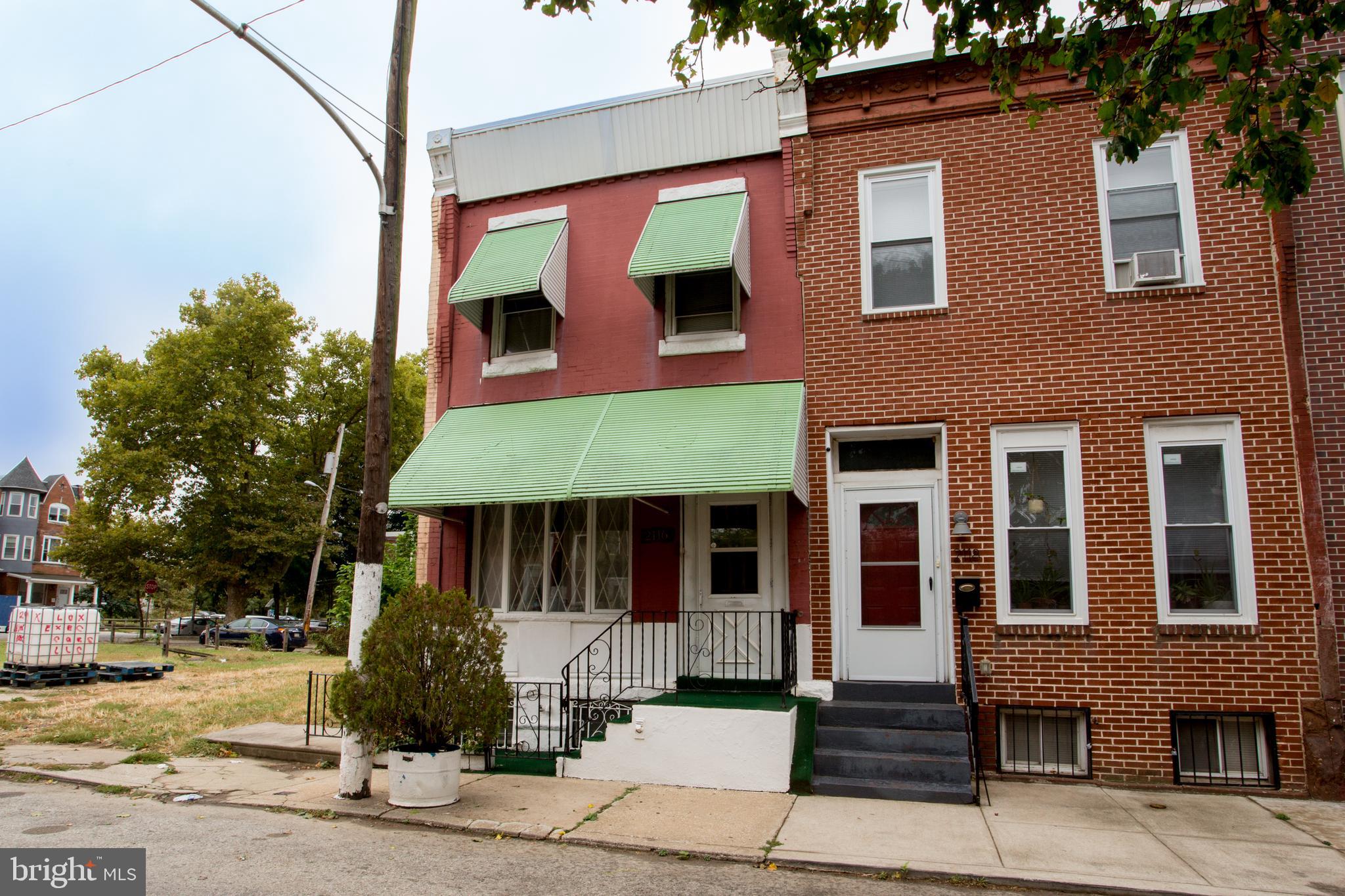 2116 North Natrona Street Philadelphia, PA 19121 - Photo 2 of 53 a front view of a house having yard