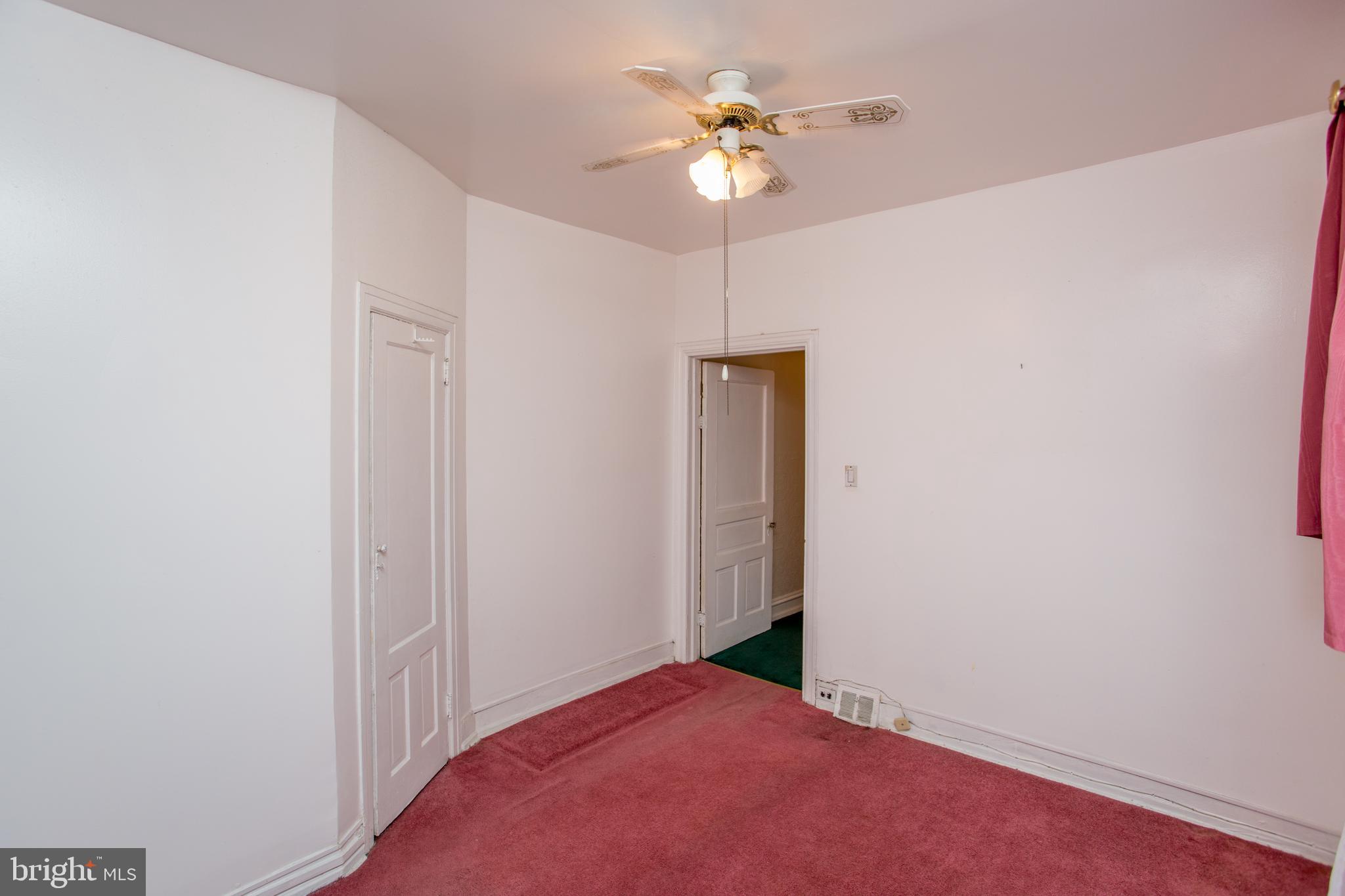 2116 North Natrona Street Philadelphia, PA 19121 - Photo 31 of 53 an empty room with a empty space and a ceiling fan
