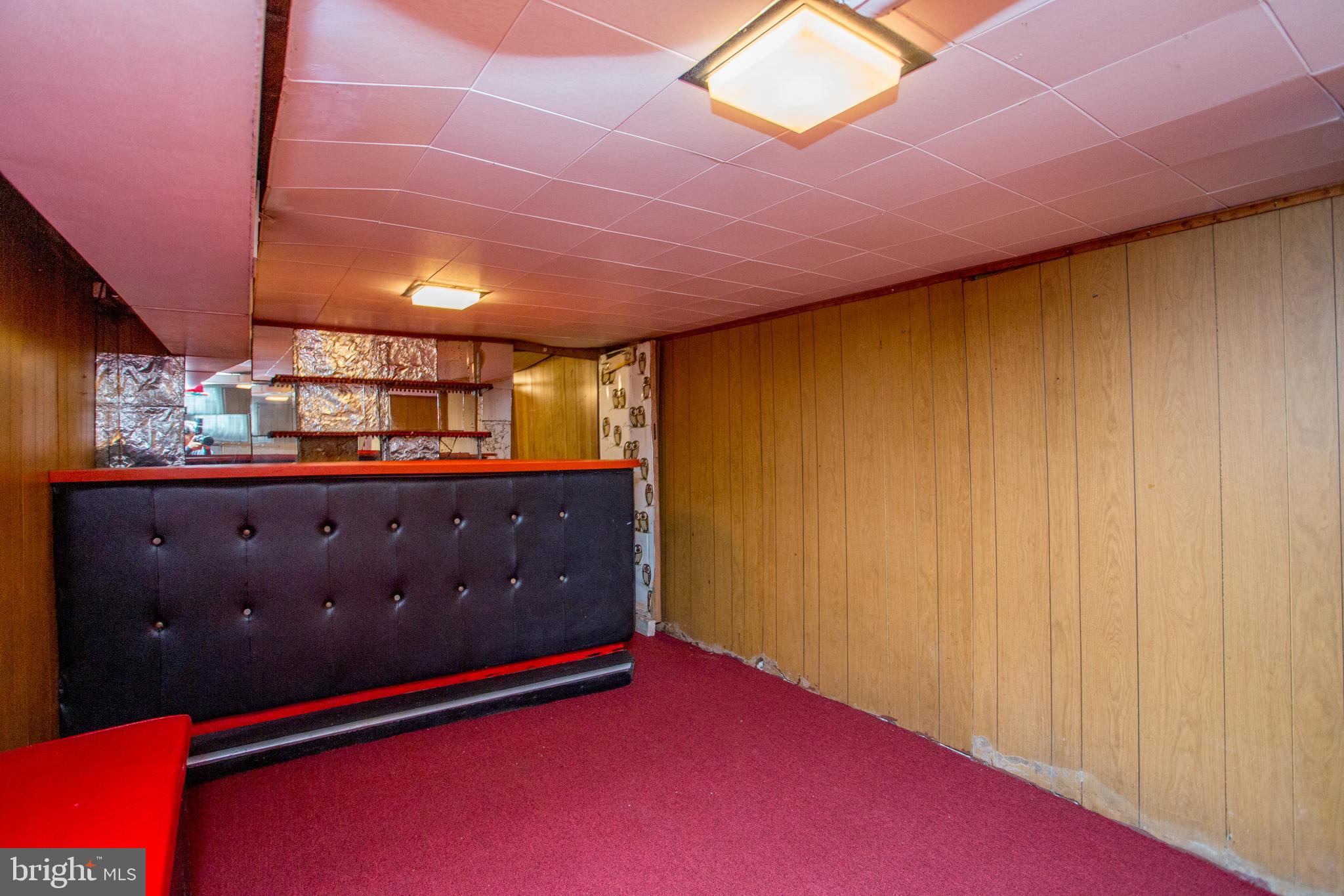 2116 North Natrona Street Philadelphia, PA 19121 - Photo 40 of 53 a room with a bed and a dresser
