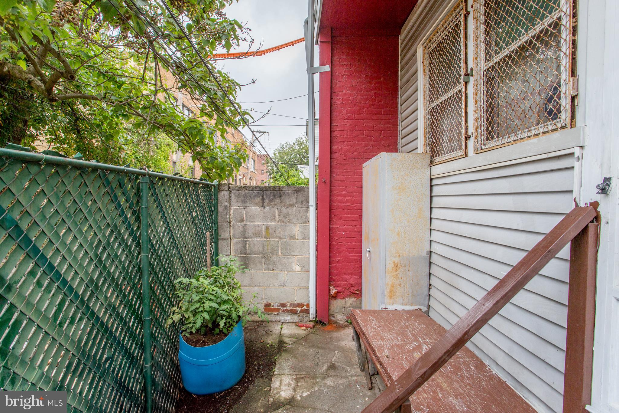 2116 North Natrona Street Philadelphia, PA 19121 - Photo 43 of 53 a view of a backyard with plants