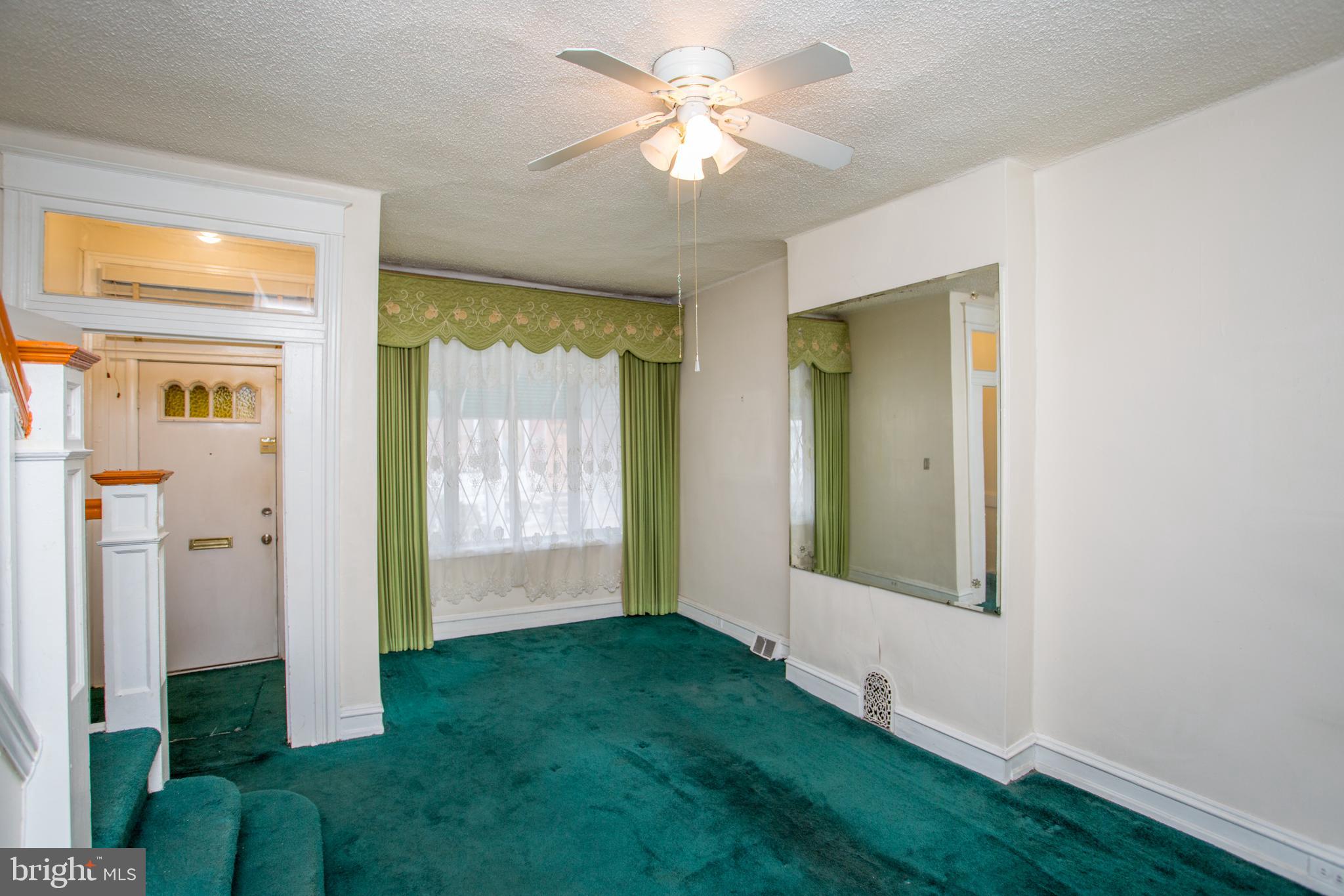 2116 North Natrona Street Philadelphia, PA 19121 - Photo 7 of 53 a view of an entryway with a chandelier fan