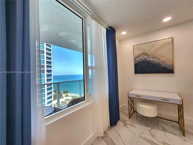 a room with furniture and a window