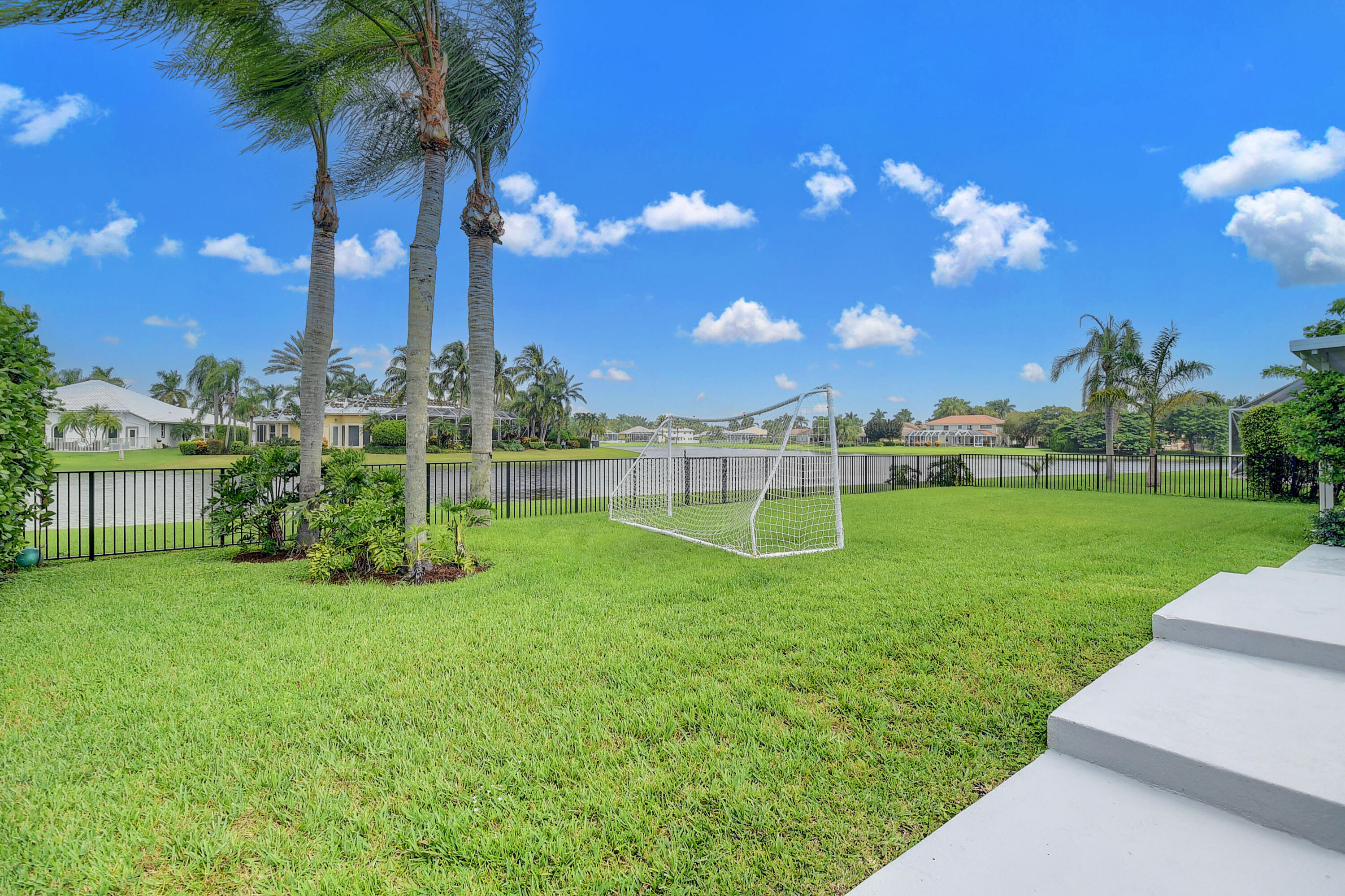 12373 Rockledge Circle Boca Raton, FL 33428 - Photo 38 of 68 a view of a golf course with a lake