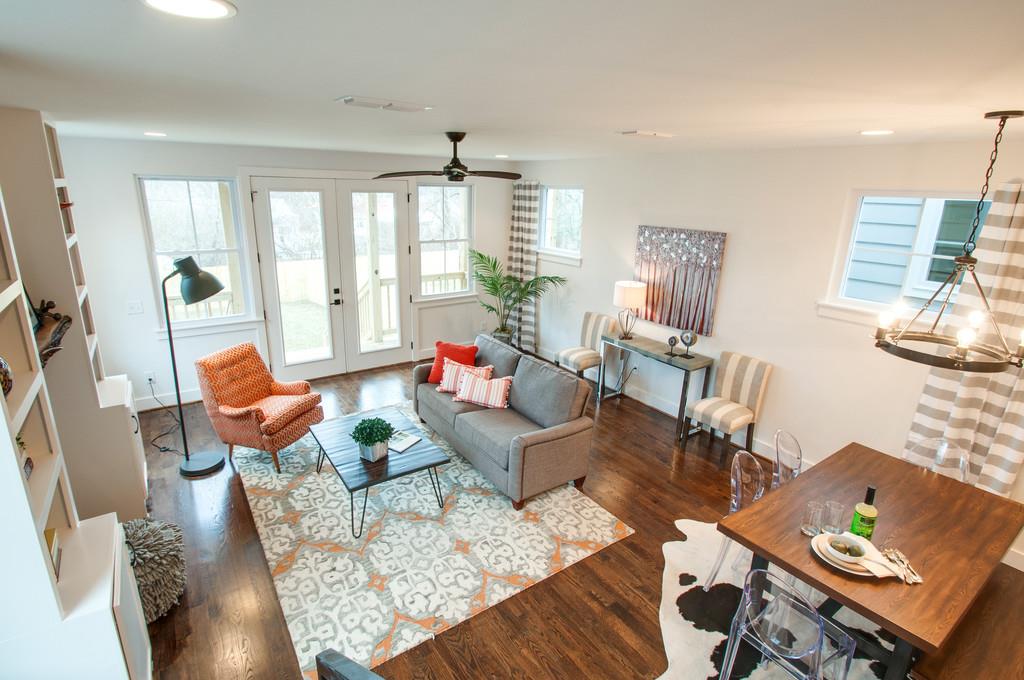 622 B Ries Avenue Nashville, TN 37209 - Photo 7 of 23 Large windows and glass doors illuminate the downstairs with natural light