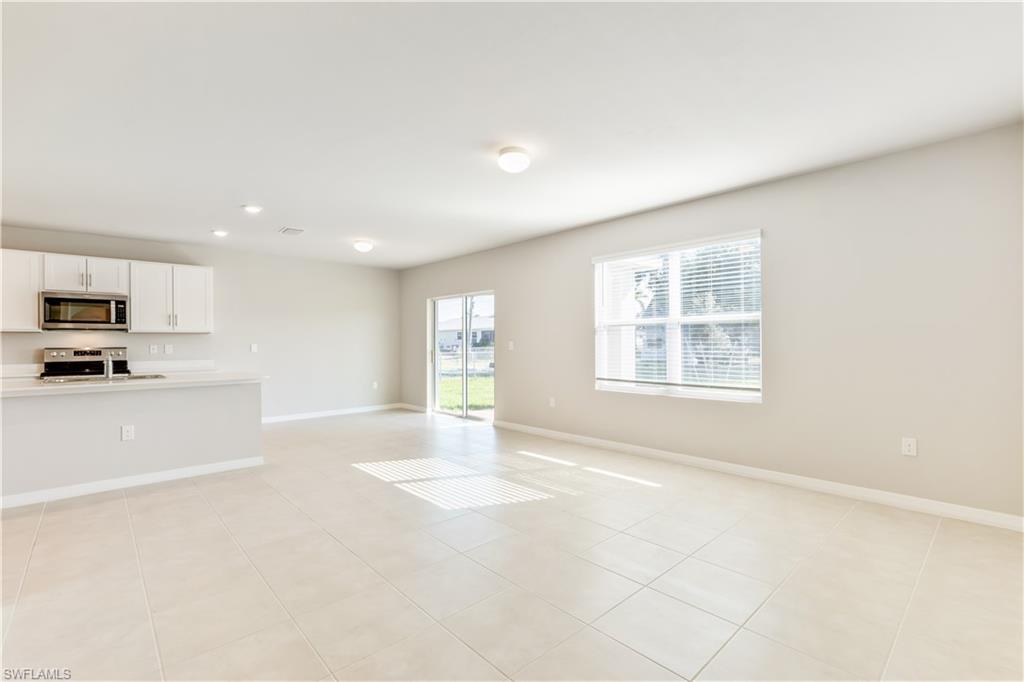 17764 Shade Tree Loop Punta Gorda, FL 33982 - Photo 11 of 48 a view of an empty room with a window