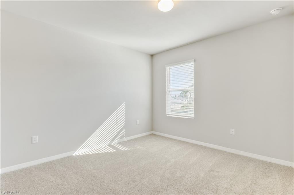 17764 Shade Tree Loop Punta Gorda, FL 33982 - Photo 16 of 48 an empty room with a window