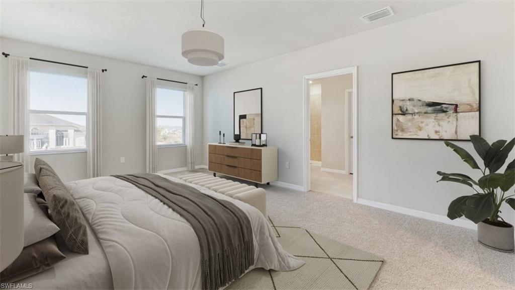 17764 Shade Tree Loop Punta Gorda, FL 33982 - Photo 6 of 12 Bedroom featuring light carpet and baseboards