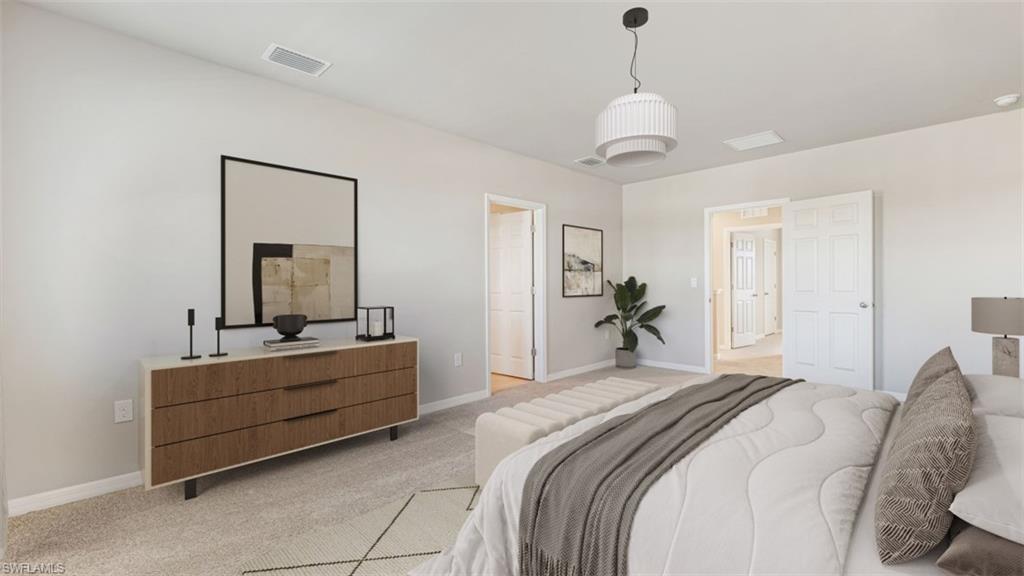 17764 Shade Tree Loop Punta Gorda, FL 33982 - Photo 7 of 12 Bedroom featuring light colored carpet and baseboards