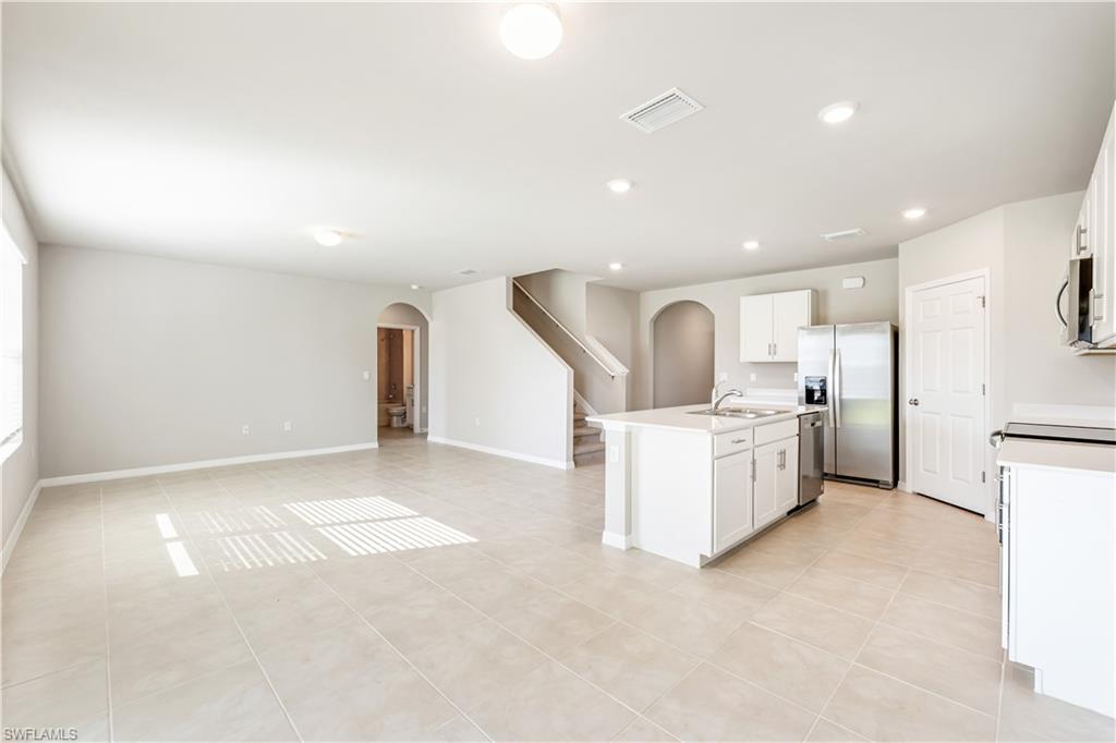 17764 Shade Tree Loop Punta Gorda, FL 33982 - Photo 9 of 48 a view of a kitchen with a sink