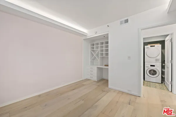 a view of an empty walk in closet