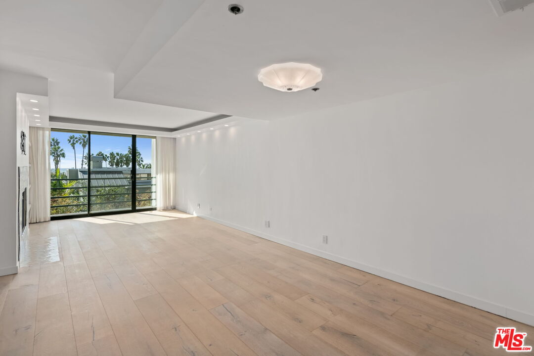 2920 Neilson Way, Unit 303 Santa Monica, CA 90405 - Photo 5 of 34 a view of an empty room with a window