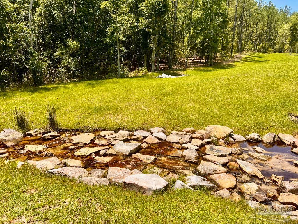 Lot 9 Creekdown Lane Jay, FL 32565 - Photo 29 of 43 a view of an ocean and beach