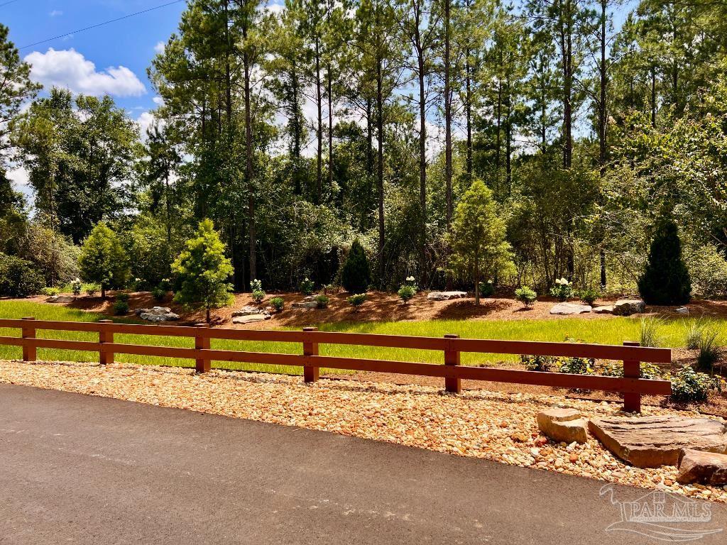Lot 9 Creekdown Lane Jay, FL 32565 - Photo 41 of 43 a view of a swimming pool with an outdoor seating