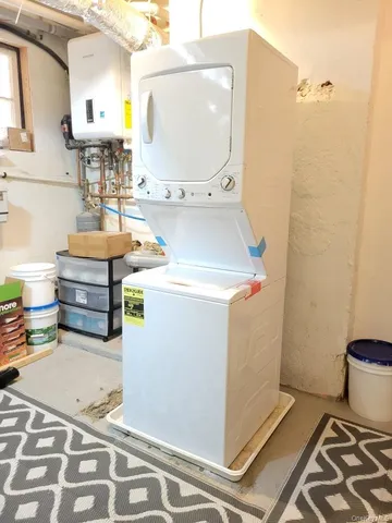 a bathroom with a sink toilet and mirror