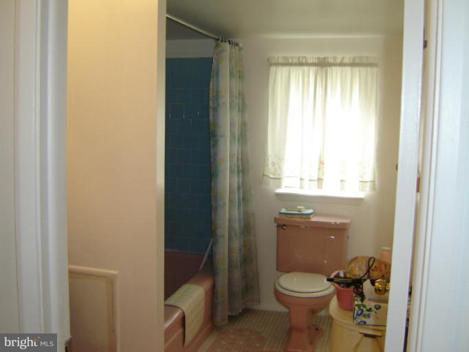2002 Kennicott Road Windsor Mill, MD 21244 - Photo 2 of 27 a bathroom with a toilet