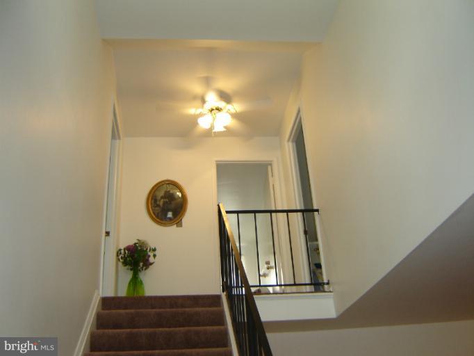 2002 Kennicott Road Windsor Mill, MD 21244 - Photo 14 of 27 a view of entryway and hall with wooden floor