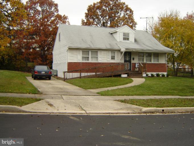 2002 Kennicott Road Windsor Mill, MD 21244 - Photo 16 of 27 a front view of a house with a yard