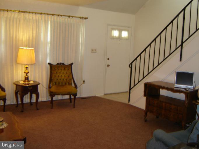 2002 Kennicott Road Windsor Mill, MD 21244 - Photo 18 of 27 a livingroom with furniture and a window