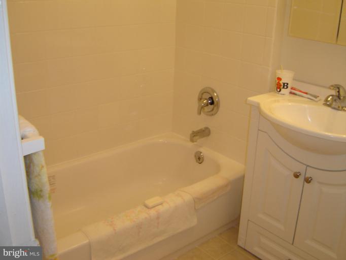 2002 Kennicott Road Windsor Mill, MD 21244 - Photo 19 of 27 a bathroom with a bathtub