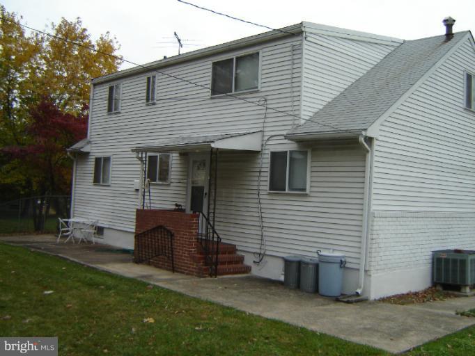 2002 Kennicott Road Windsor Mill, MD 21244 - Photo 20 of 27 a view of a house with a yard