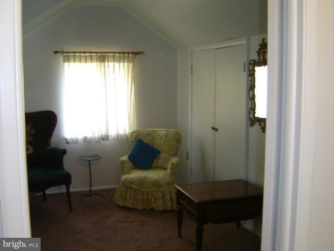 2002 Kennicott Road Windsor Mill, MD 21244 - Photo 22 of 27 a living room with furniture and a window