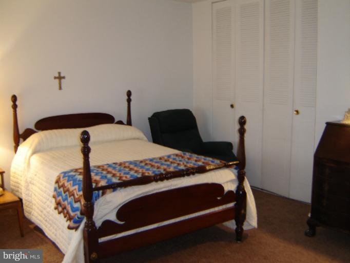 2002 Kennicott Road Windsor Mill, MD 21244 - Photo 25 of 27 a bedroom with bed and a window