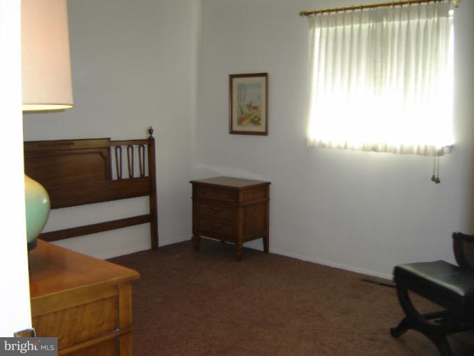 2002 Kennicott Road Windsor Mill, MD 21244 - Photo 7 of 27 a living room with furniture and a window