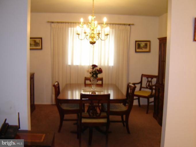 2002 Kennicott Road Windsor Mill, MD 21244 - Photo 9 of 27 a dining room with furniture and window