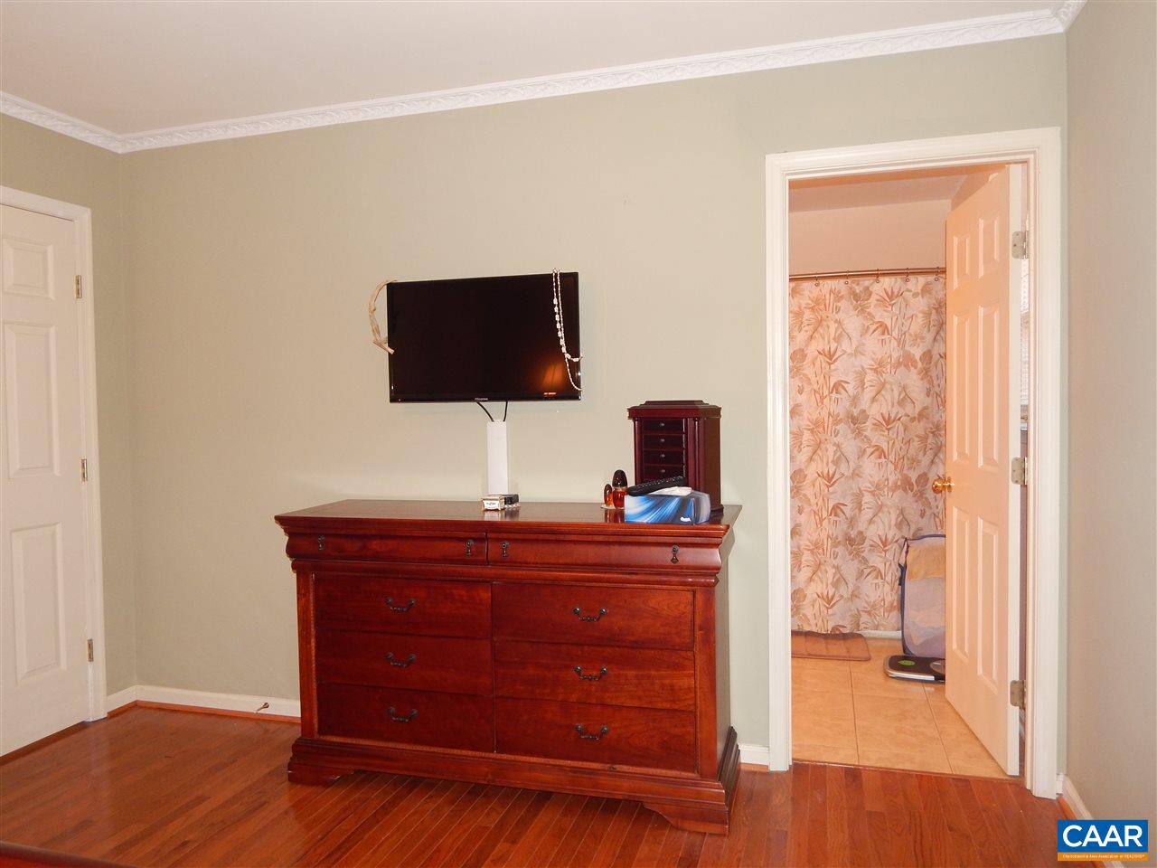 14 East Point Road Palmyra, VA 22963 - Photo 11 of 19 a living room with furniture and a flat screen tv